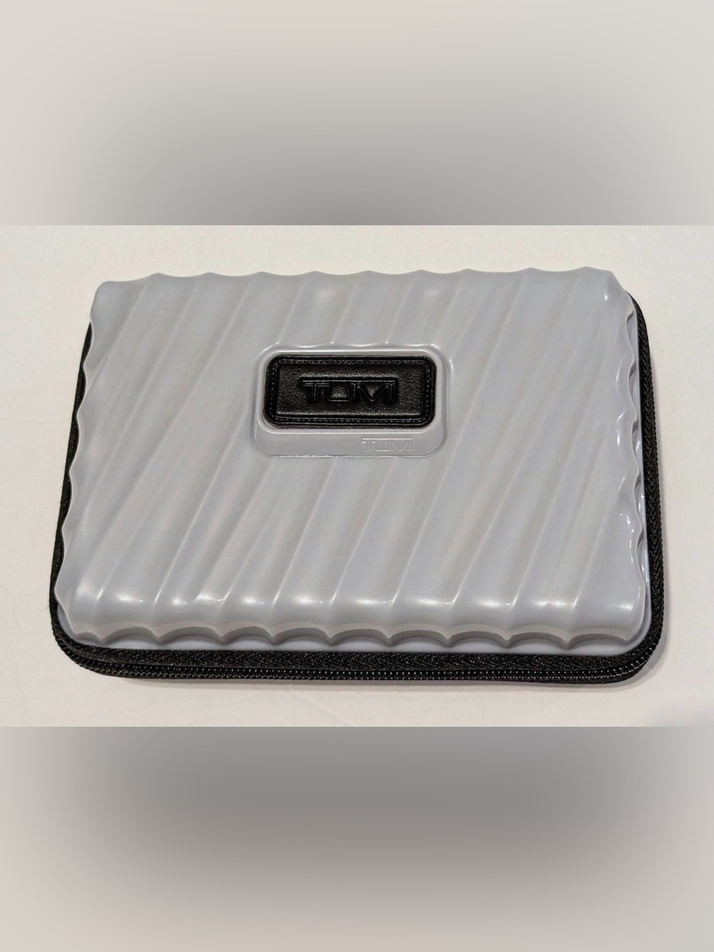 Tumi Gray Ridged Small Hard Shell Accessory Case with Black Logo